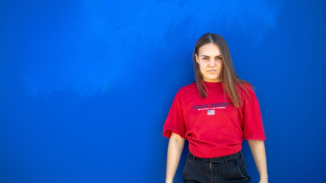 Studio portrait of a friendly middle-aged Croatian woman program coordinator